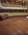 Crawl space drainage matting installed in a home in Pooler