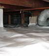 A Summerville crawl space moisture system with a low ceiling