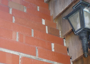 a repaired chimney in Griffin that had shown serious foundation damage and was repaired with a helical pier system.