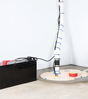 A sump pump installed in Peachtree City by Lowcountry Foundation and Crawl Space Repair