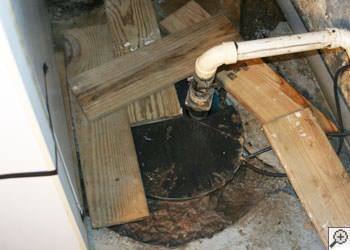 An ugly, clogged sump pump system in Summerville, Georgia and South Carolina