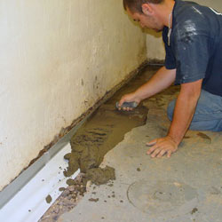 Testing a French drain system in a Hinesville home.