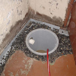 Installing a sump in a sump pump liner in a Macon home