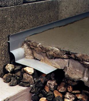 a custom designed basement drain system for thin basement floors in Okatie.