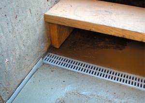 a hatchway entrance in Johns Island that has been protected from flooding by our TrenchDrain basement drainage system.